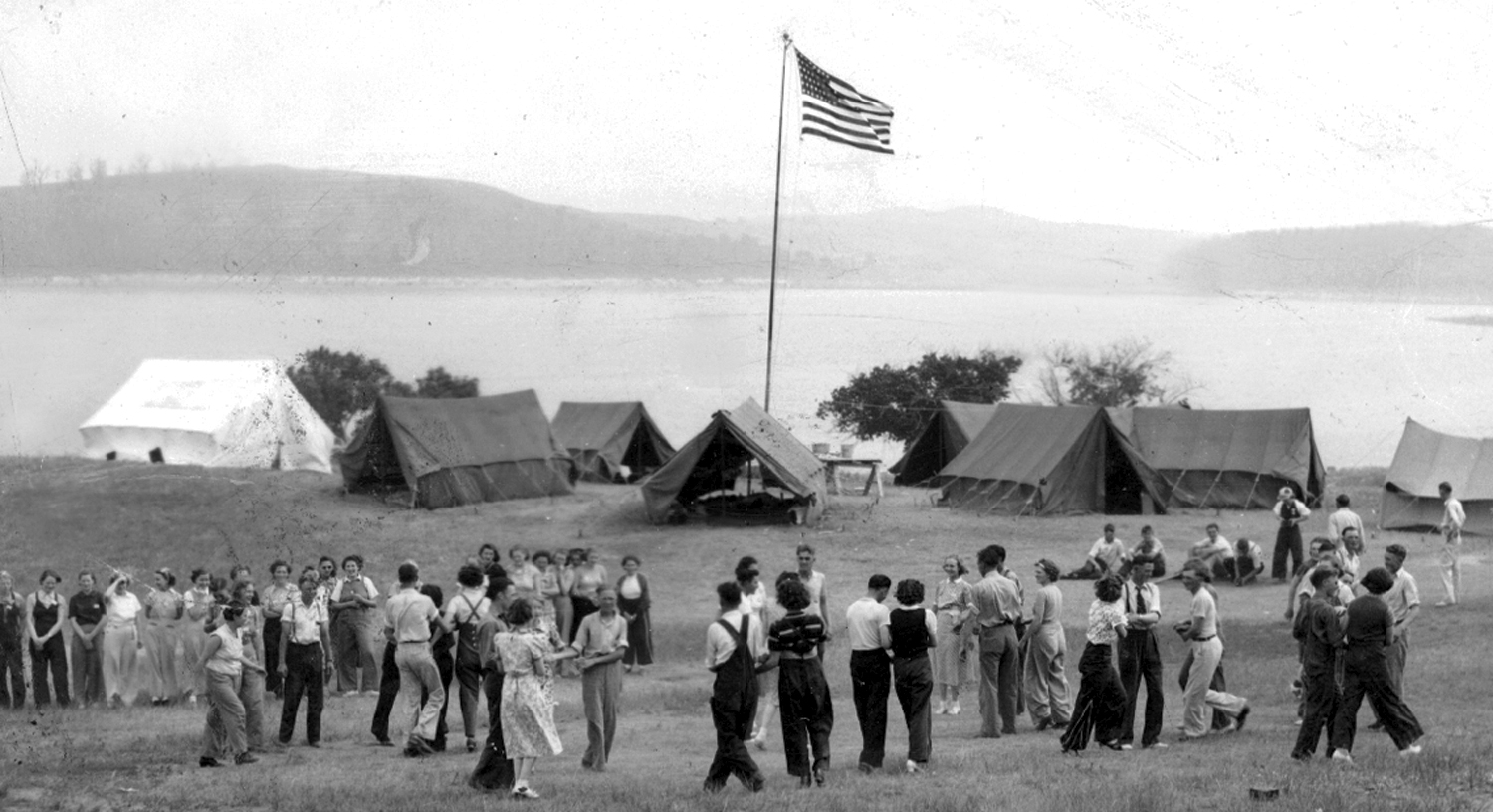 Group of people looking at First Camp Set up