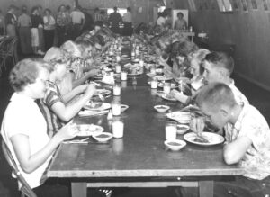People eating at a long table